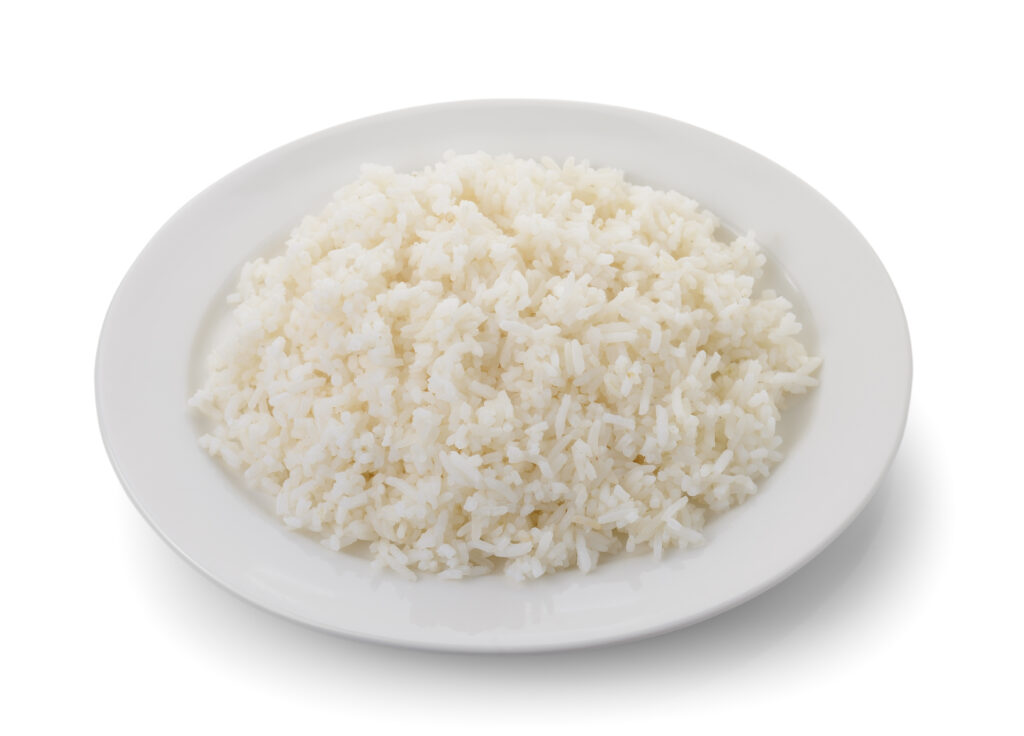 "Barefoot rice on a white plate with a white background"