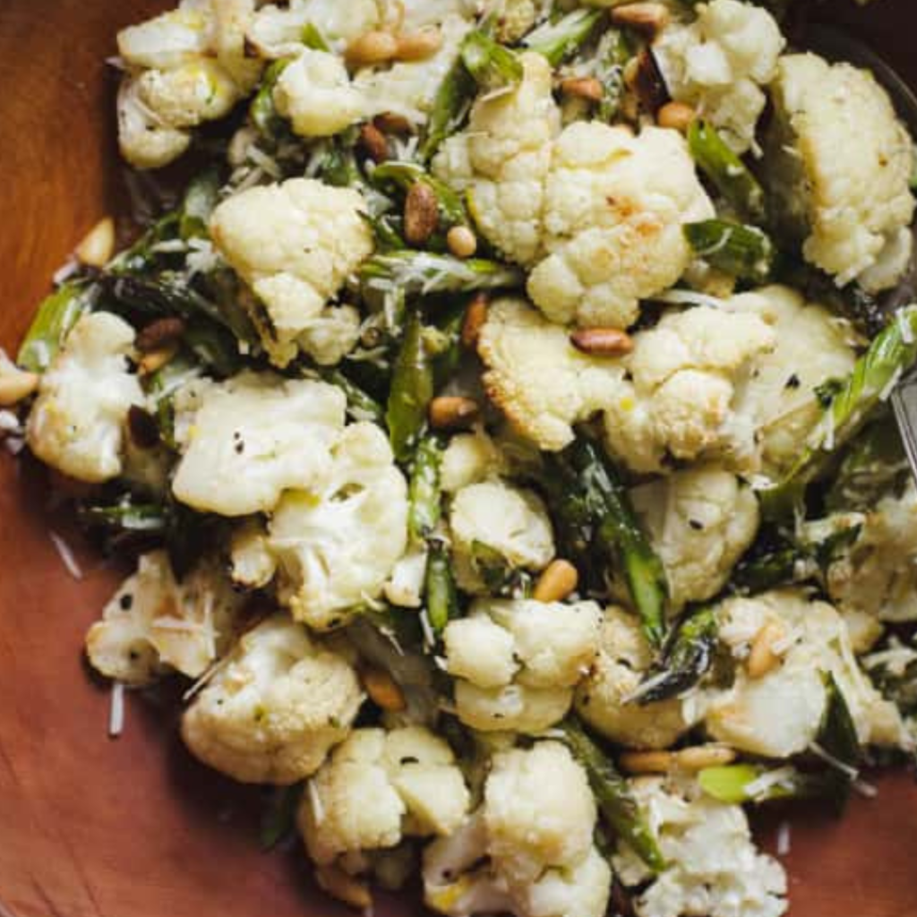 "Roasted cauliflower and asparagus salad with pine nut"