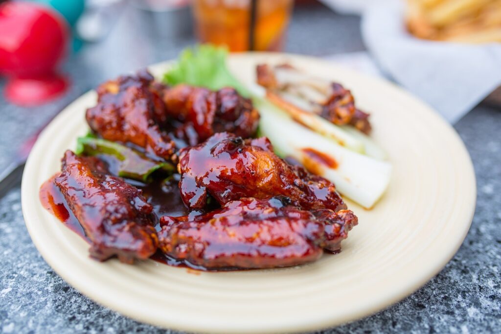 "BBQ Buffalo wings on a plate"