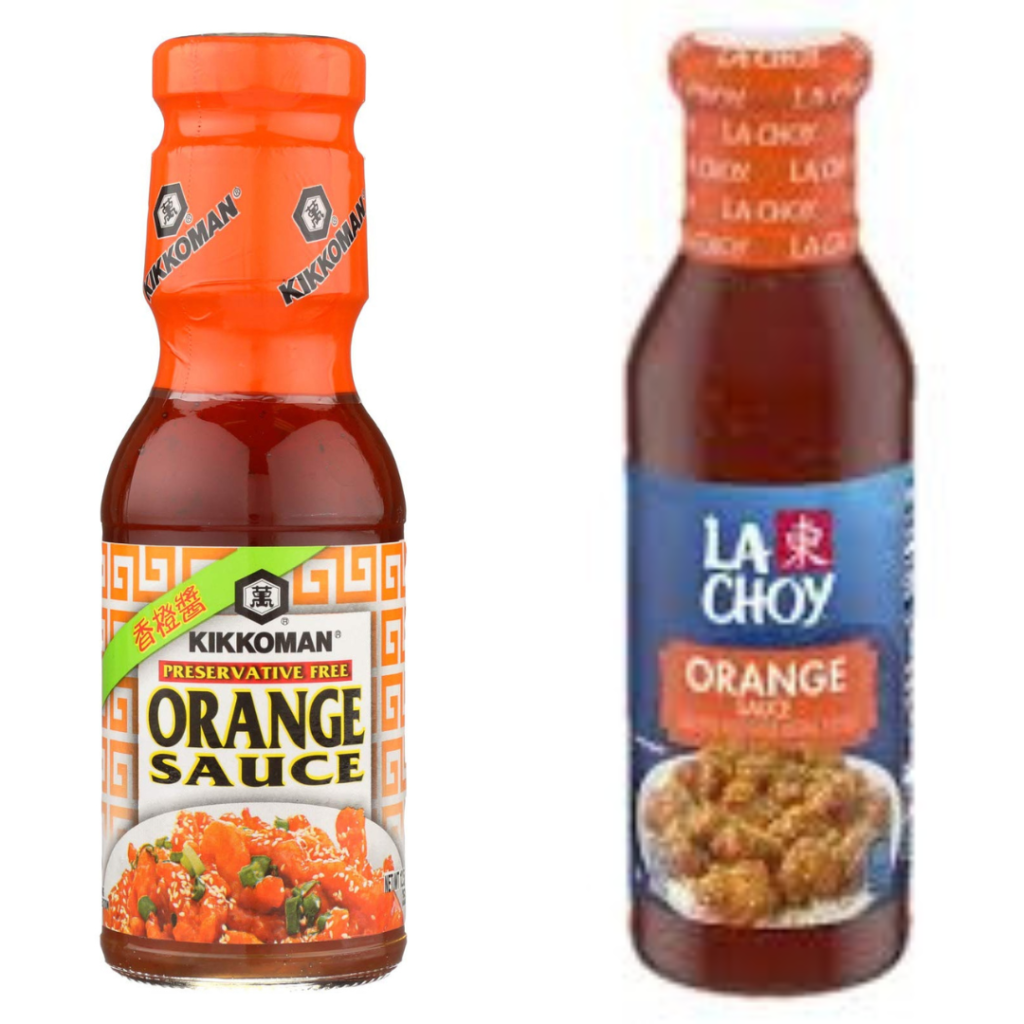 "Bottled orange sauce on white background"