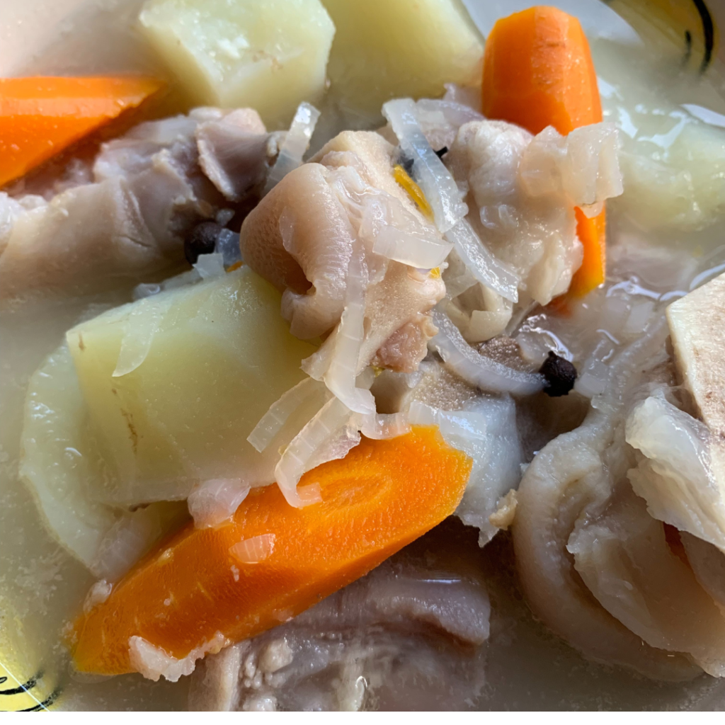 "Pig feet and cow foot souse with onions, carrots, potatoes and browth