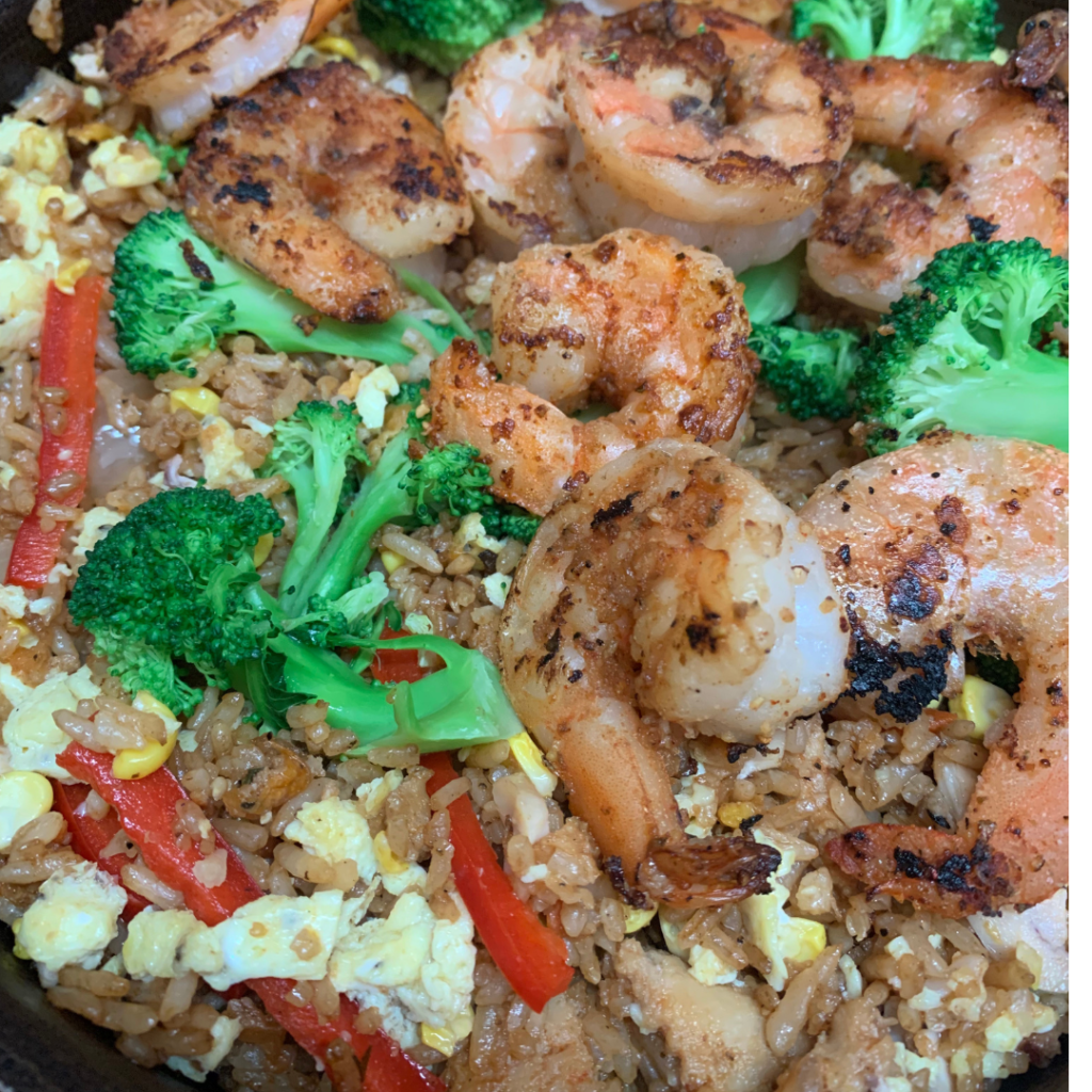 "Rice with broccoli, bell pepper, shrimps, egg"