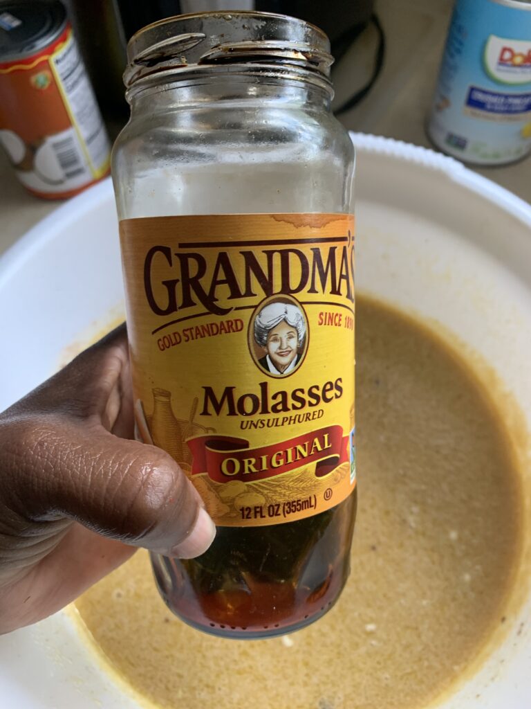 "Adding molasses to the heavy cream mixture for bread pudding"