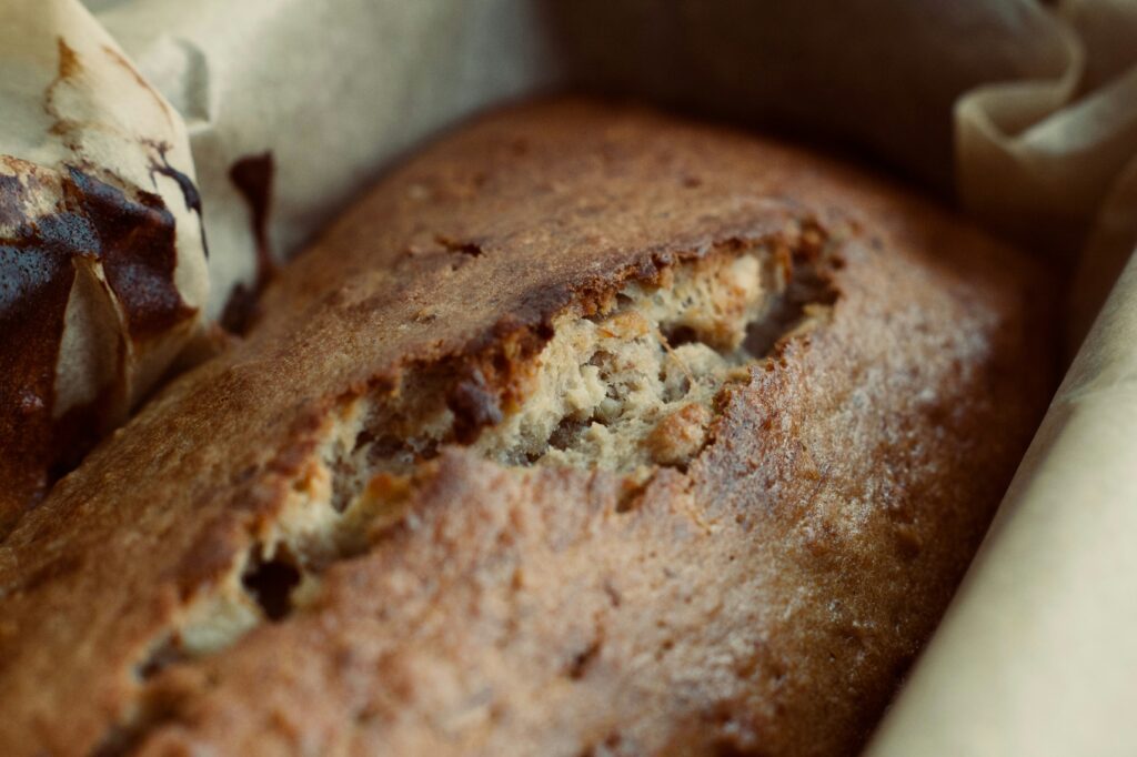 "Baked Banana Bread in a loaf pan"