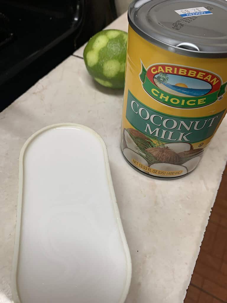 Coconut milk and lime on a counter