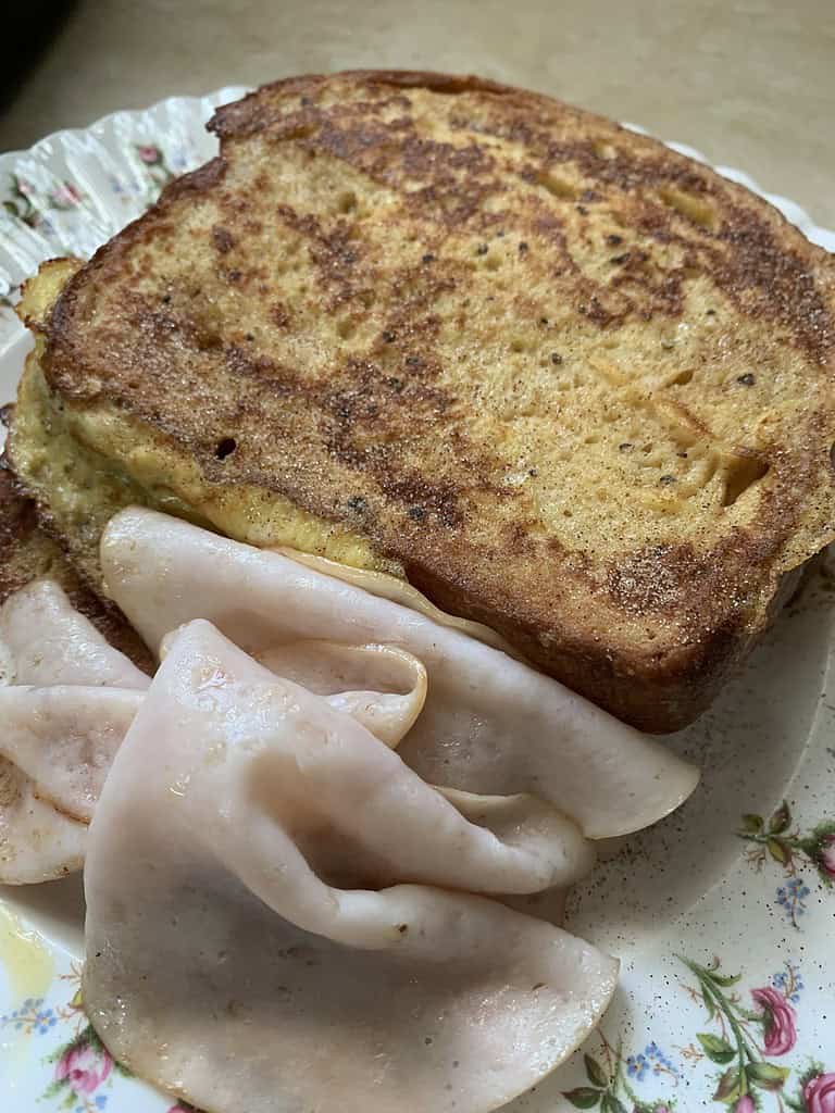 French toast made with coconut bread on a plate