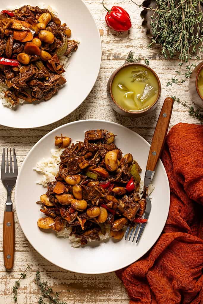 plant based oxtail in a whit plate with a fork