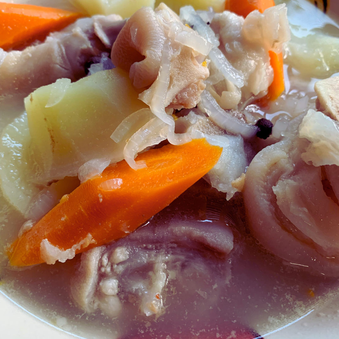 "authentic Bahamian pig feet souse with cow foot"