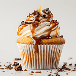 Pumpkin spiced latte cupcakes on a white background with chocolate dusting
